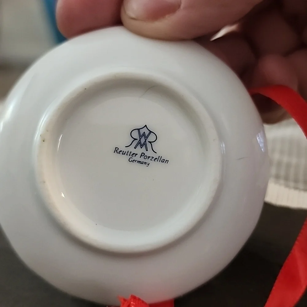 Christmas ornaments, miniature tea cups and tea pots